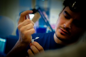 lysing cells through a syringe